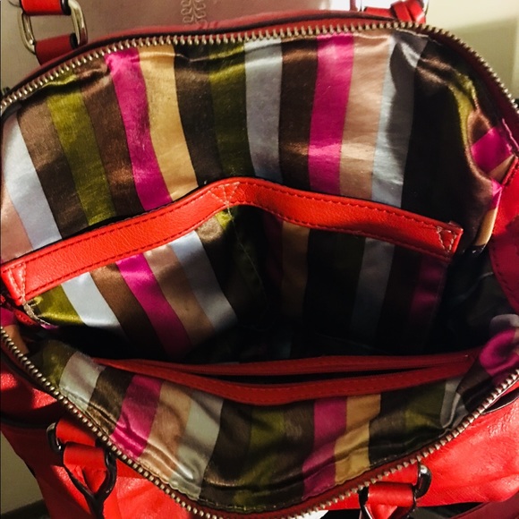 Tignanello Handbags - Tignanello leather purse in a red color. ❤️